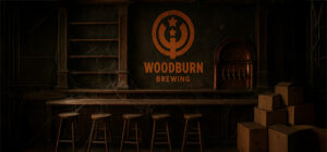 AI generated image of an empty woodburn taproom, with boxes stacked in the corner.
